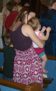 Mom and kids in church
